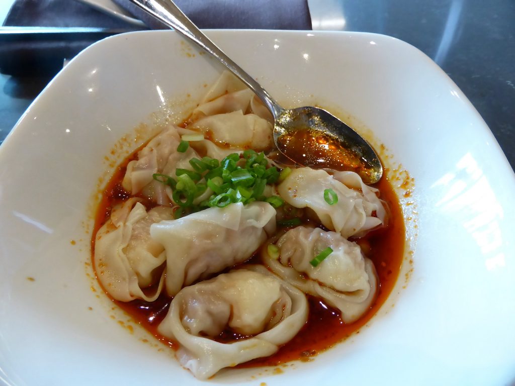 Pork dumplings in a chilli broth